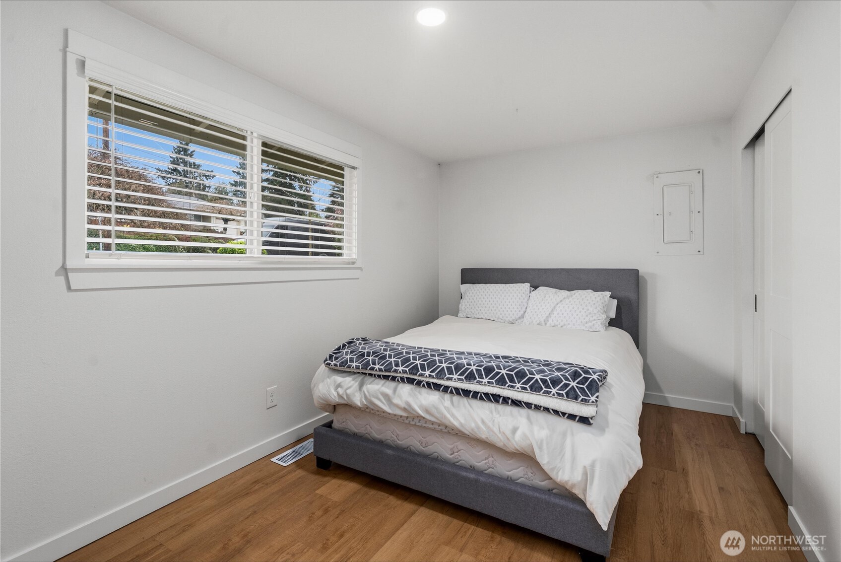 The main floor deck overlooking the backyard - and the sunsets  - runs the length of the house