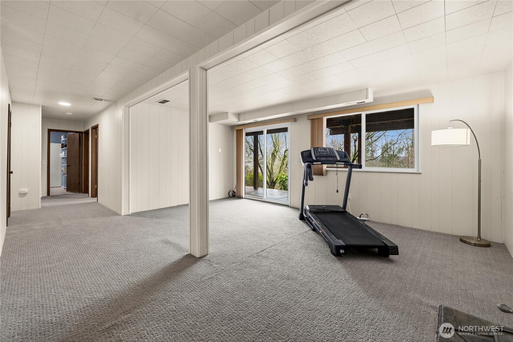 Bedroom 4 downstairs has it's own view of the backyard.