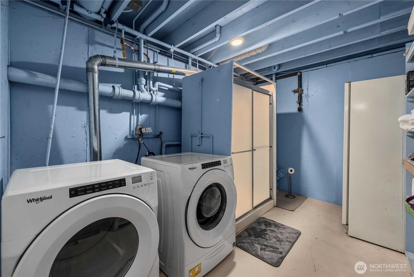 The downstairs patio runs the length of the house and provides even more space for entertaining or just enjoying the backyard.