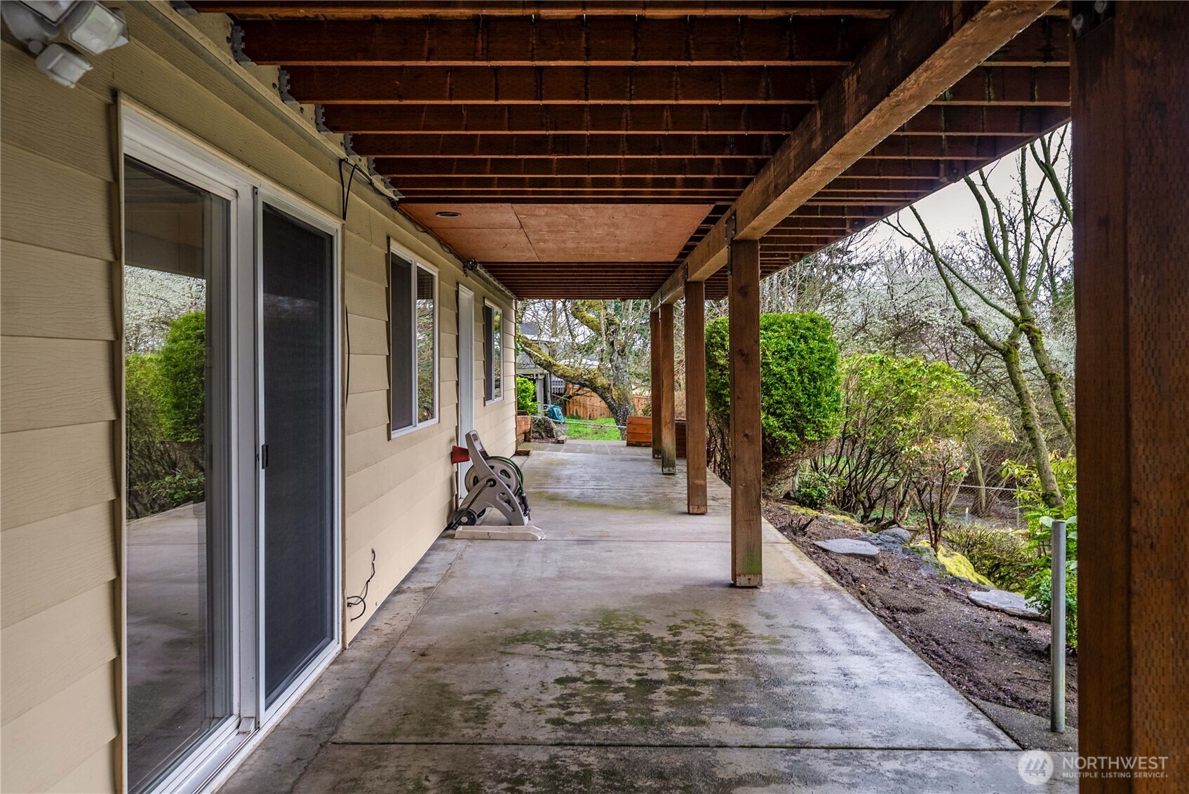 Gardens, a dog run, and tons of lawn in the professionally landscaped backyard.