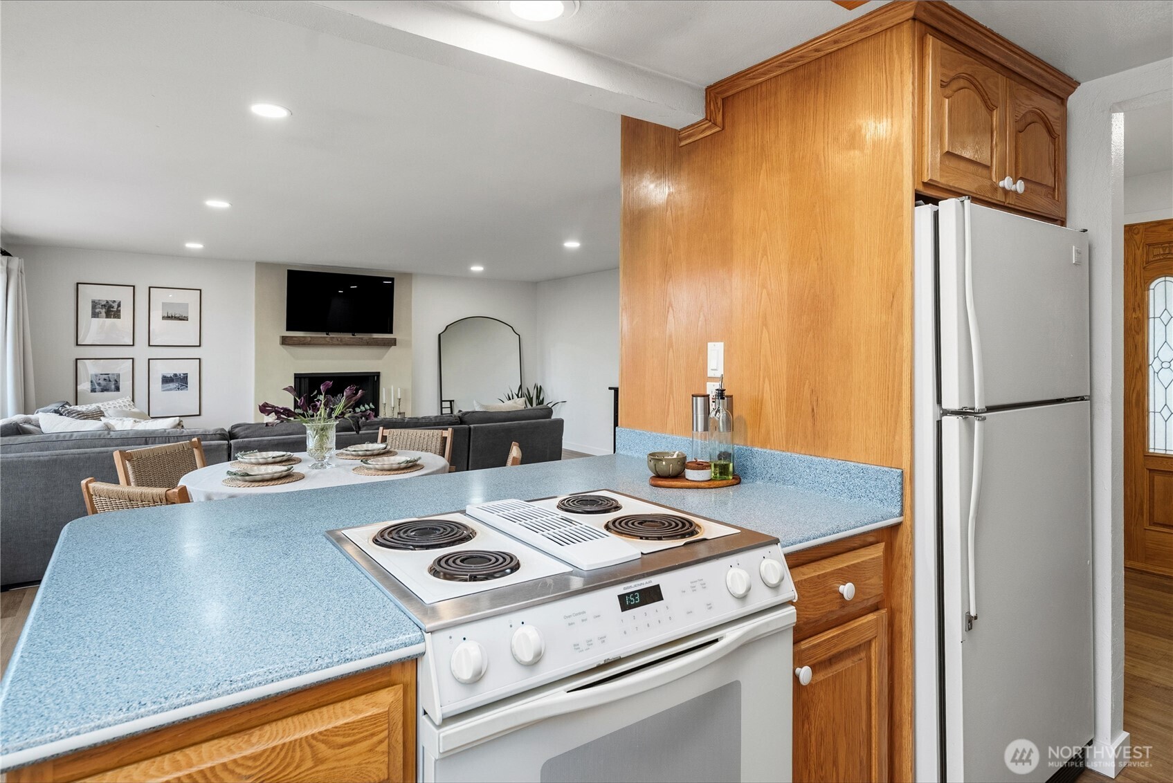 Updated Custom metal railings really set off the new wide plank LVP flooring in the main living areas and on the stairs.