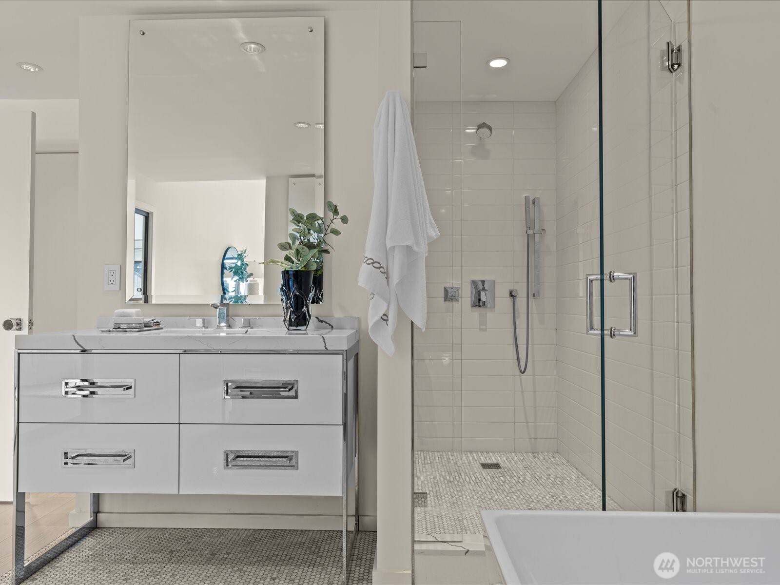 Versatile second bedroom, ideal for a home office, featuring significant closet and storage space