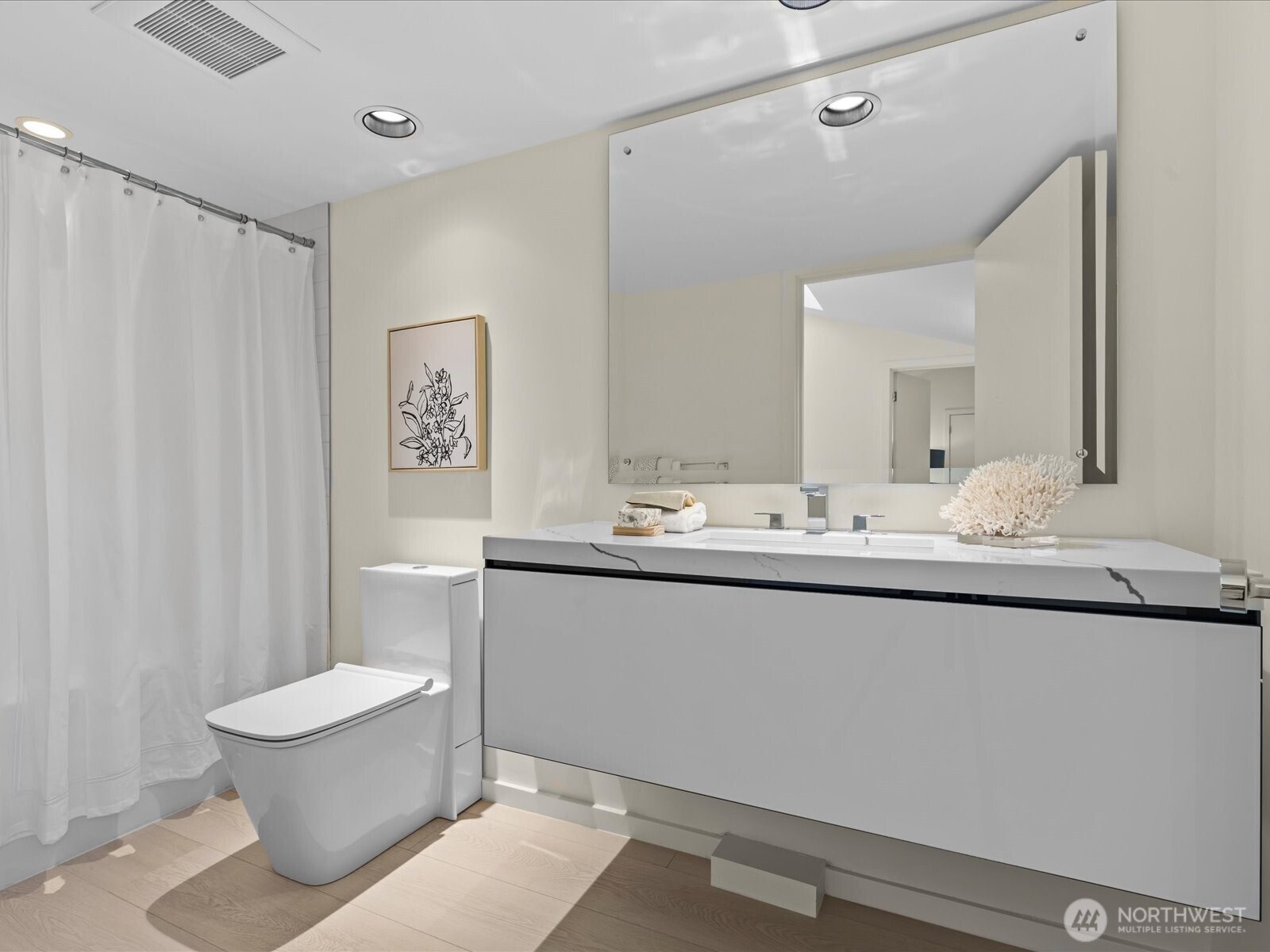 Spacious third bedroom with wonderful light and substantial closet space.