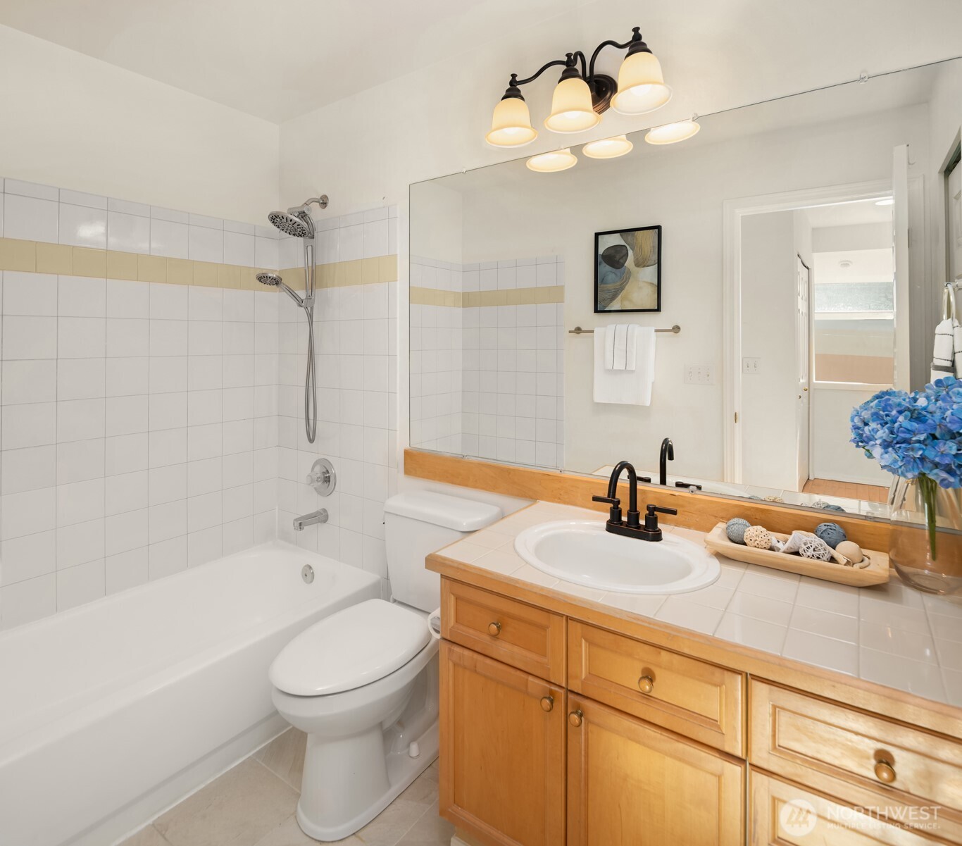 Spacious guest bathroom with tub!