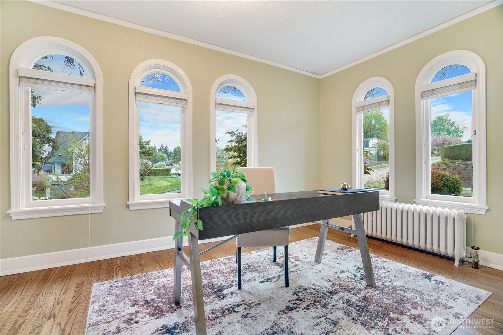 Arched windows. Natural light. The office that makes you want to work from home.