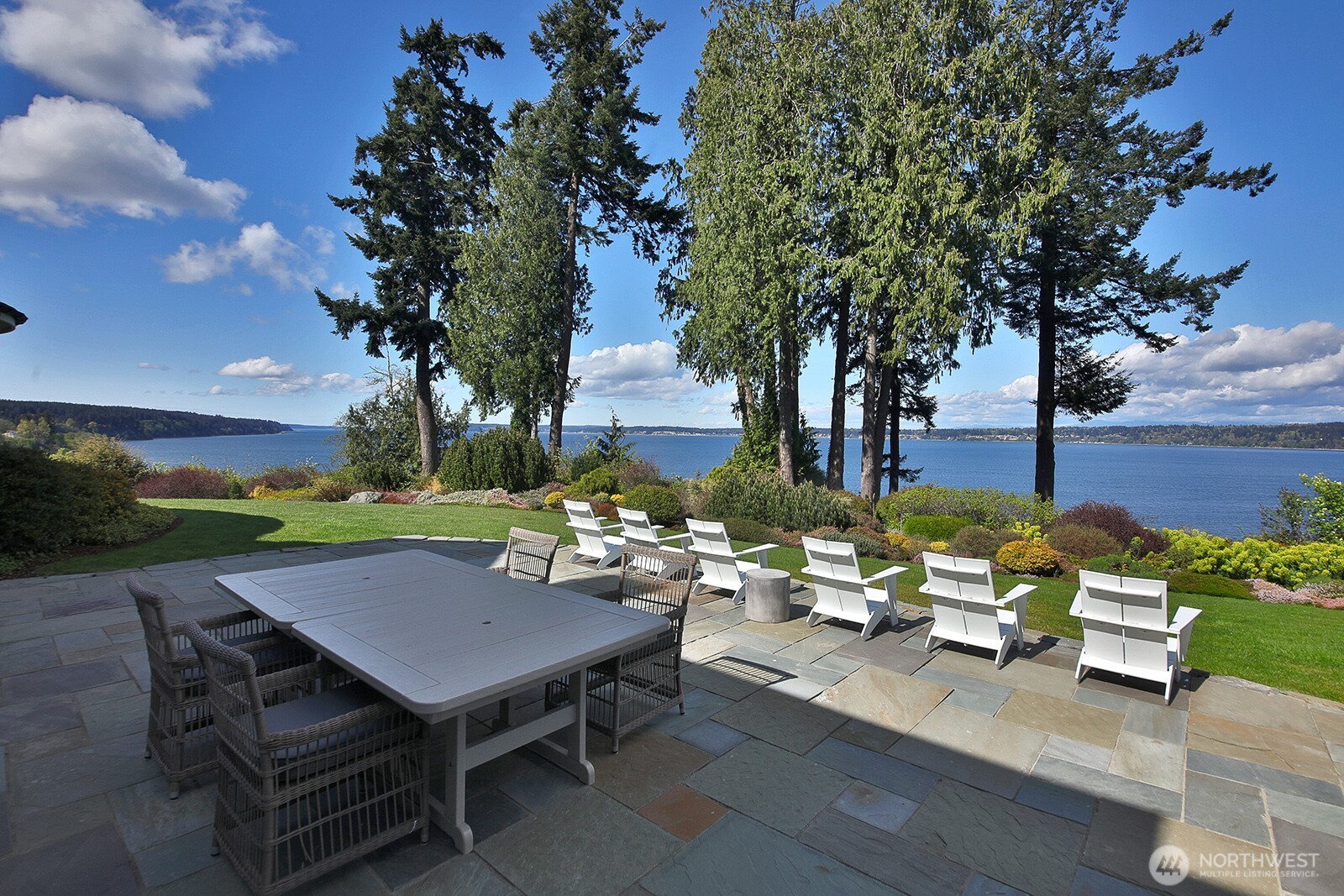 The view extends up through Saratoga Passage and includes the Cascade Mountains and Mt. Baker.