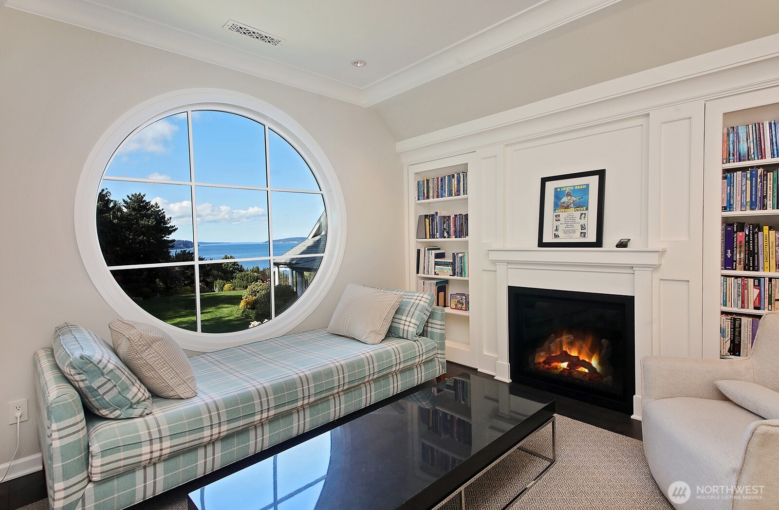 Above the garage in the office/guest quarters, with a 3/4 bath as well as a kitchenette. And porthole window!