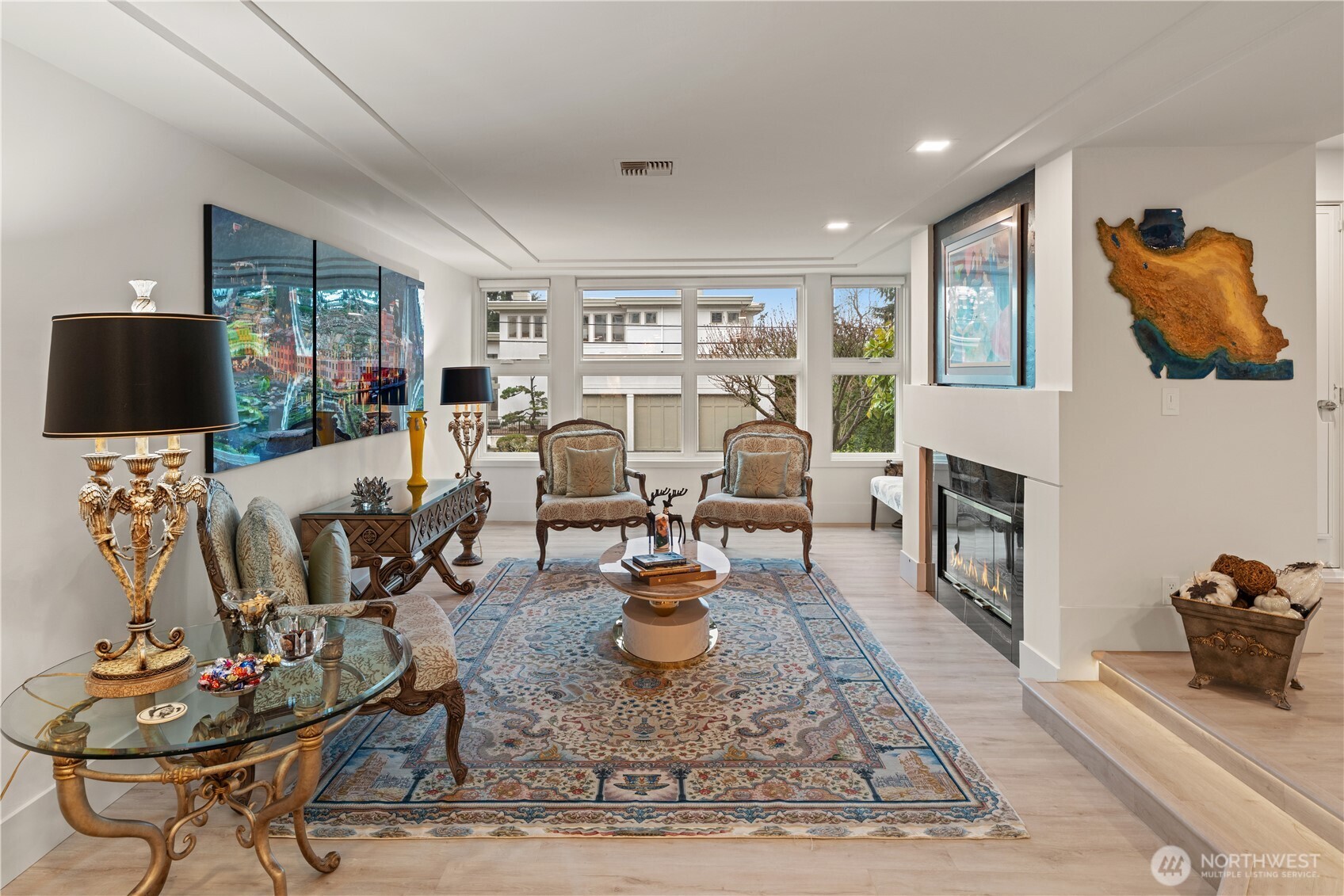 The living room offers a gas fireplace for winter months