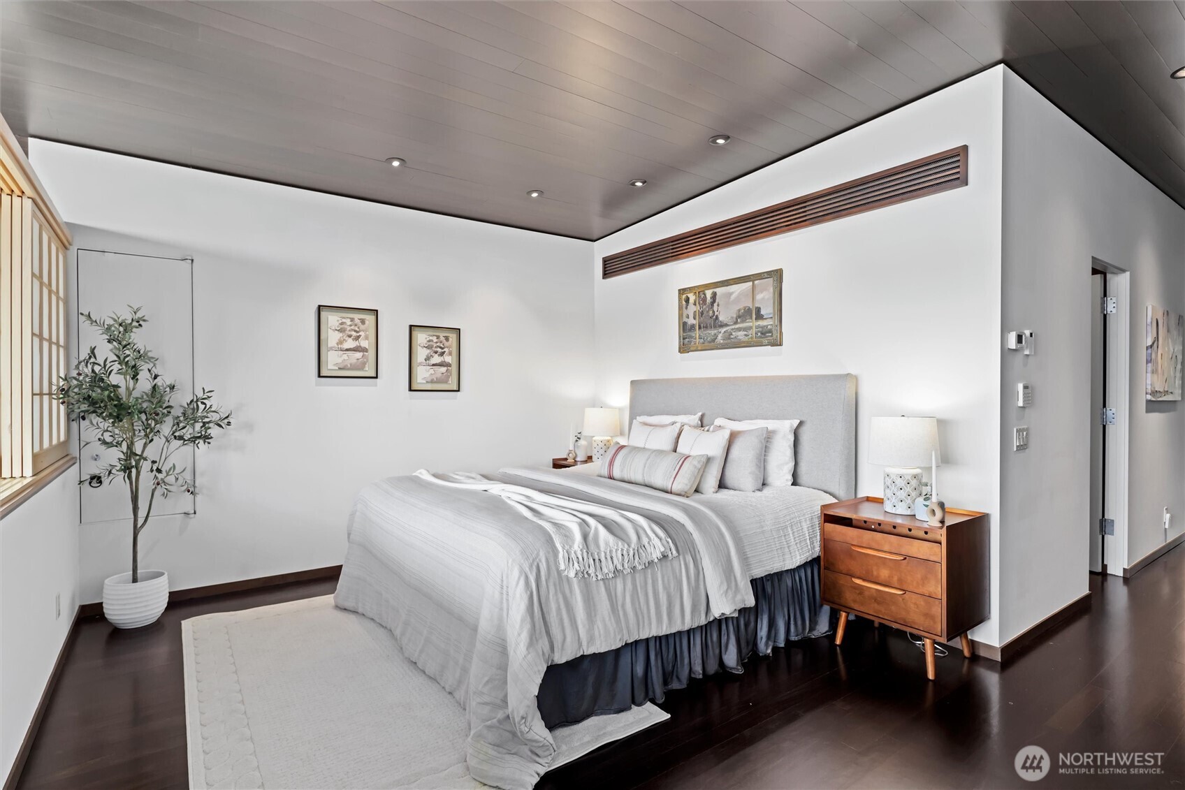 Primary bedroom with lake views