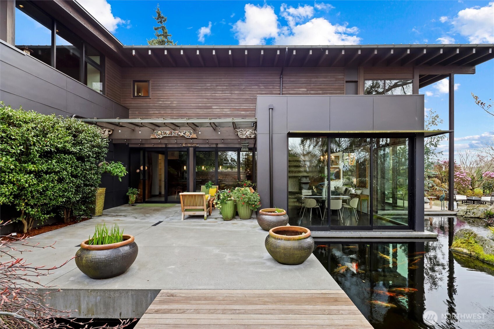 Stunning bridged entry over koi ponds