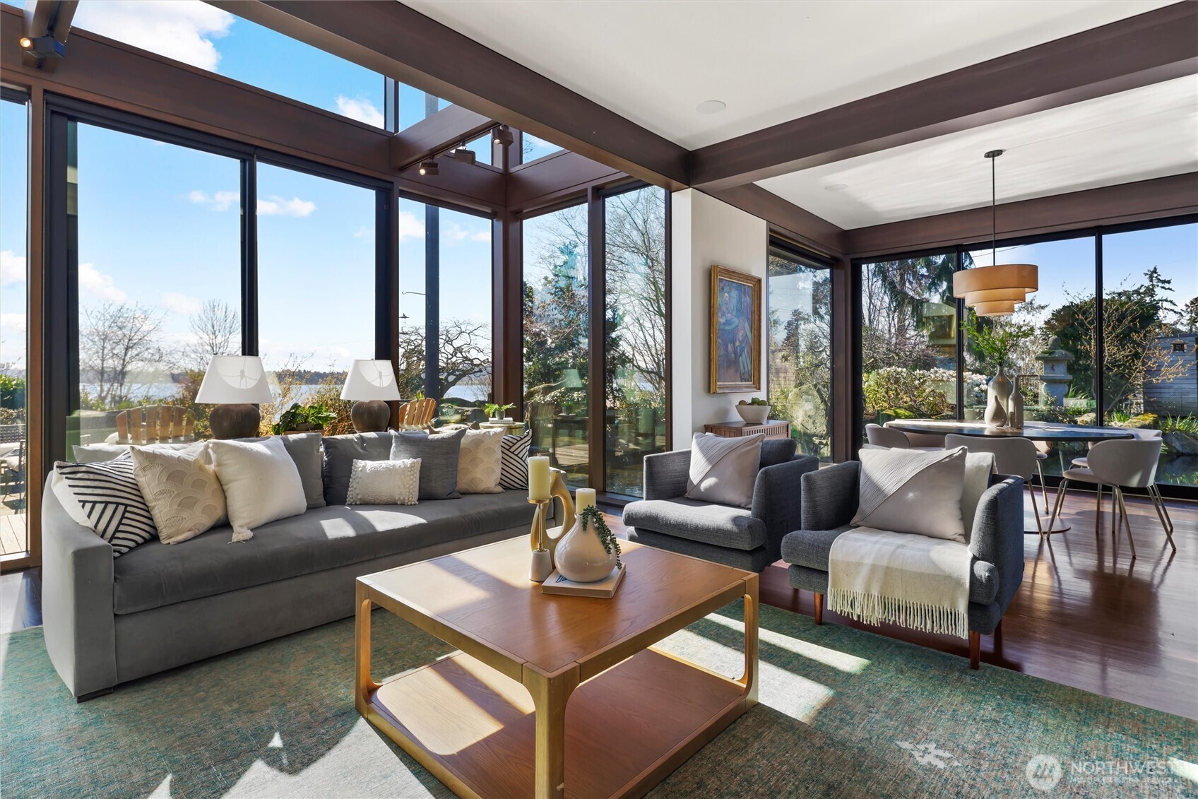 Light-filled living room with Tulikivi Finnish soapstone fireplace