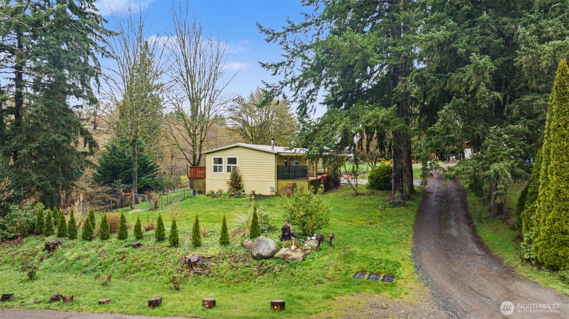 View from the main road. Shared driveway with home behind.
