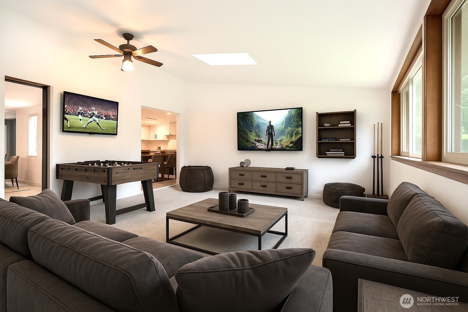 Bonus /Media room features an open, light-filled layout with neutral finishes.
