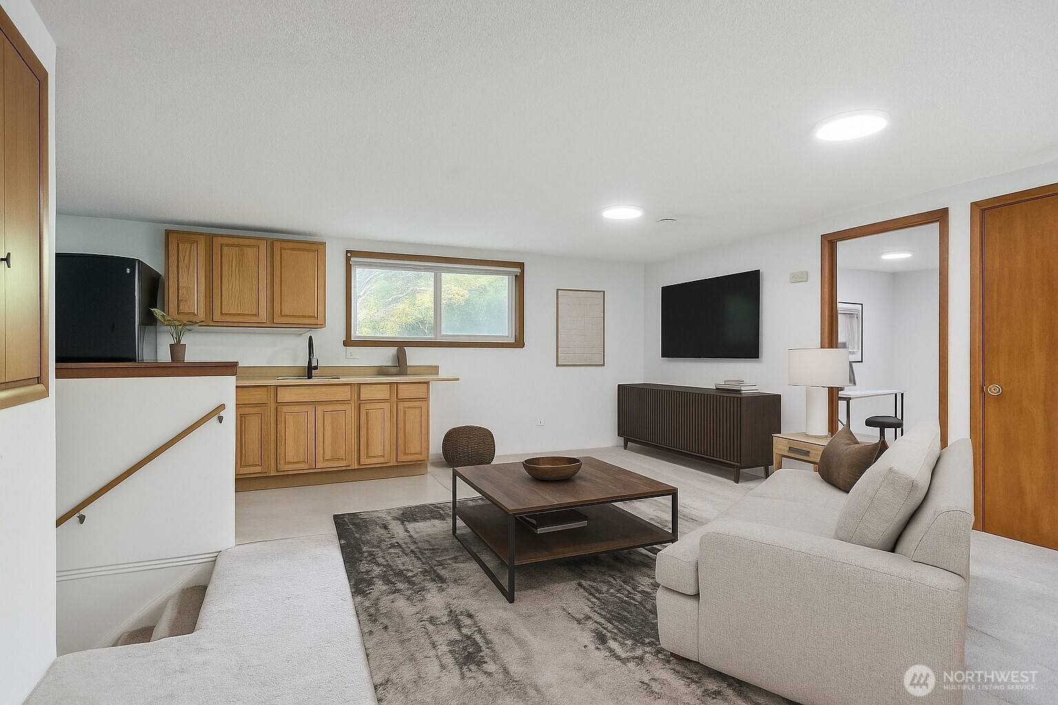 Upstairs has bonus room, mini kitchen, 2 bedrooms and 3/4 bath.