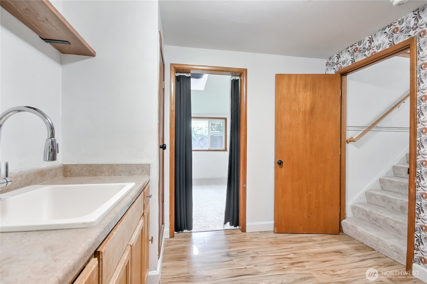 Solarium with tons of natural lighting, sky lights and hot tub open up to the backyard.
