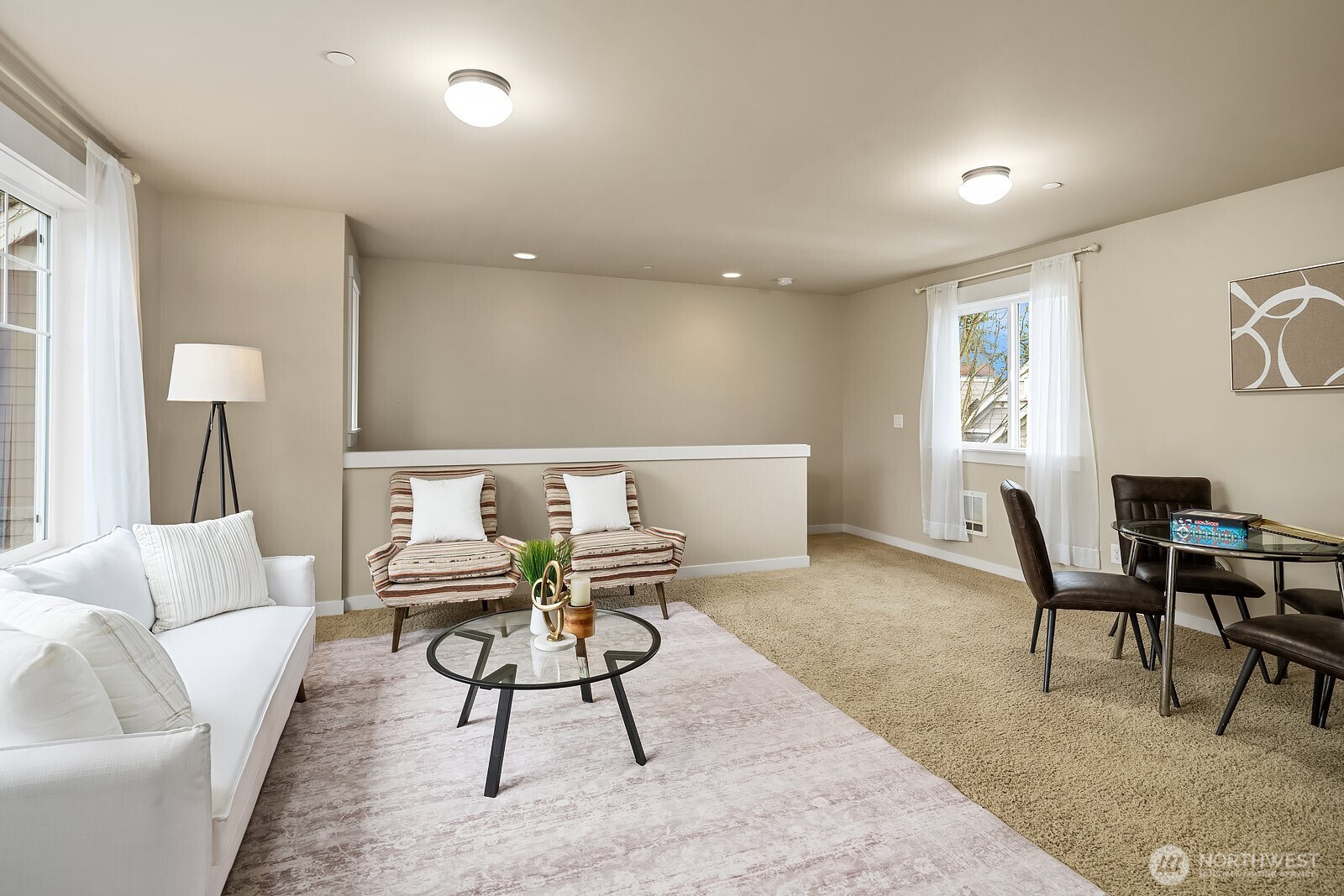 This angle of the ADU showcases the open and well-proportioned living and dining areas, with soft neutral tones and ample natural light creating a comfortable and welcoming atmosphere for any occupant.