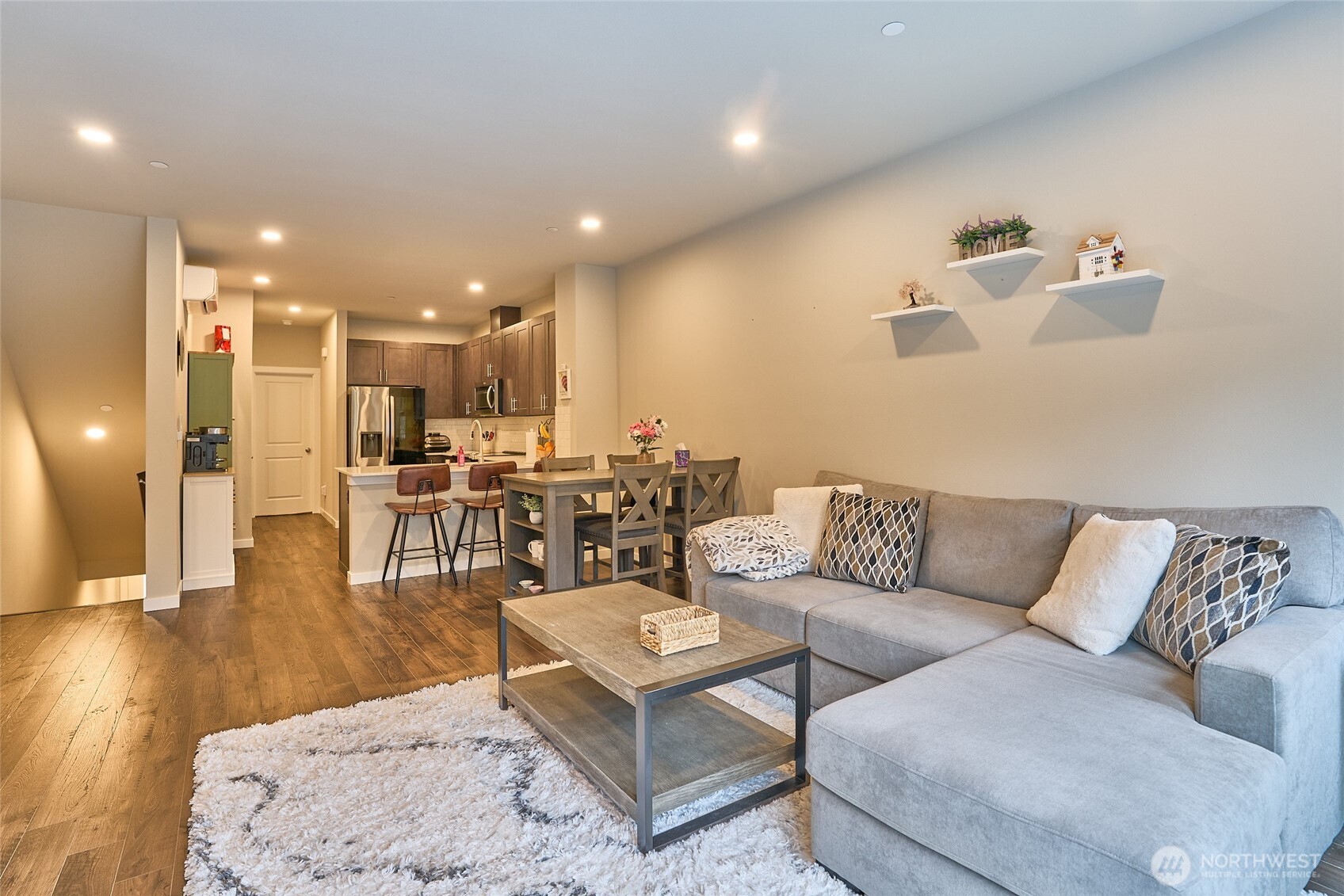 Open concept area, great for entertaining. Gorgeous finishes!