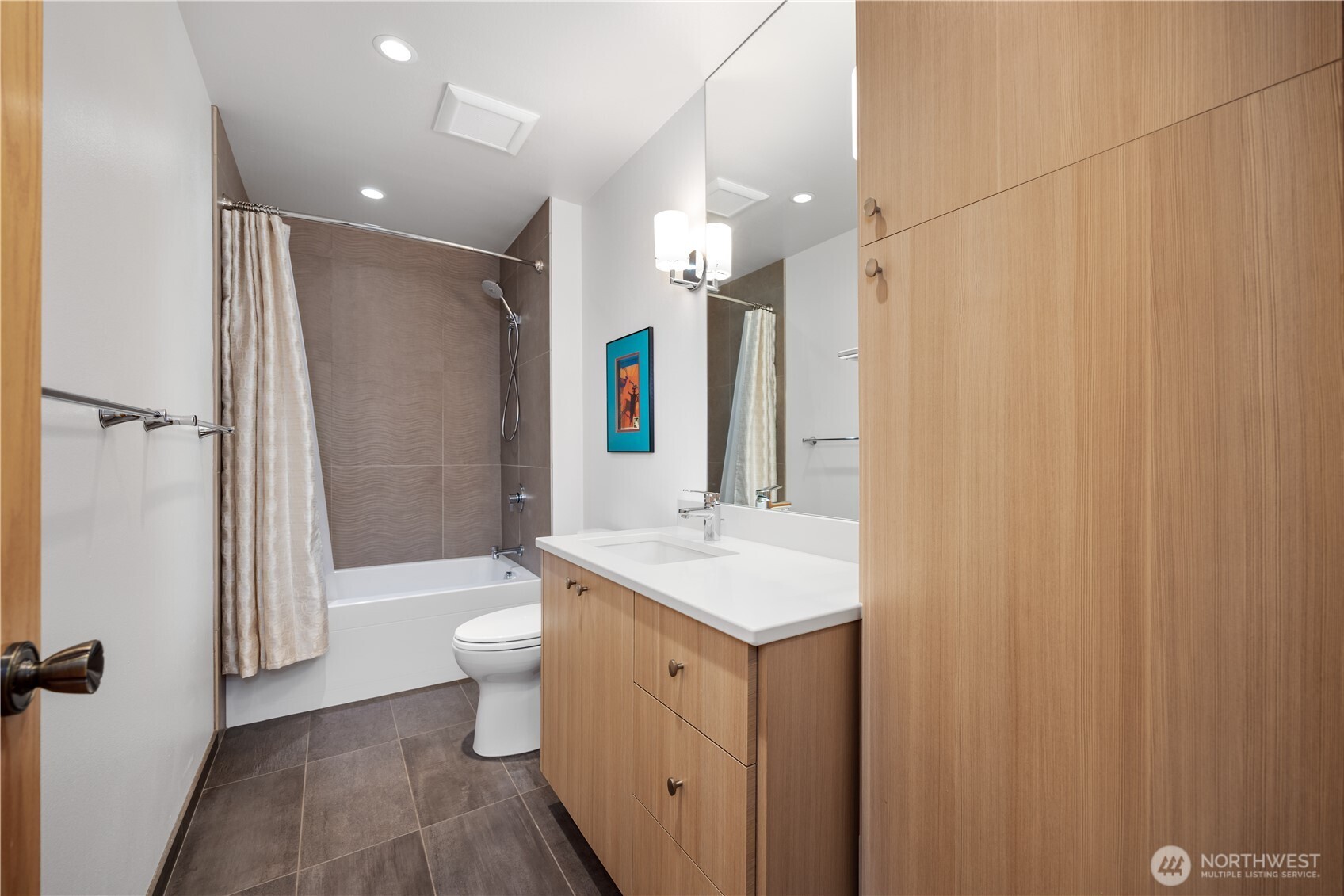 Guest Bath with large tub and stunning spa style.