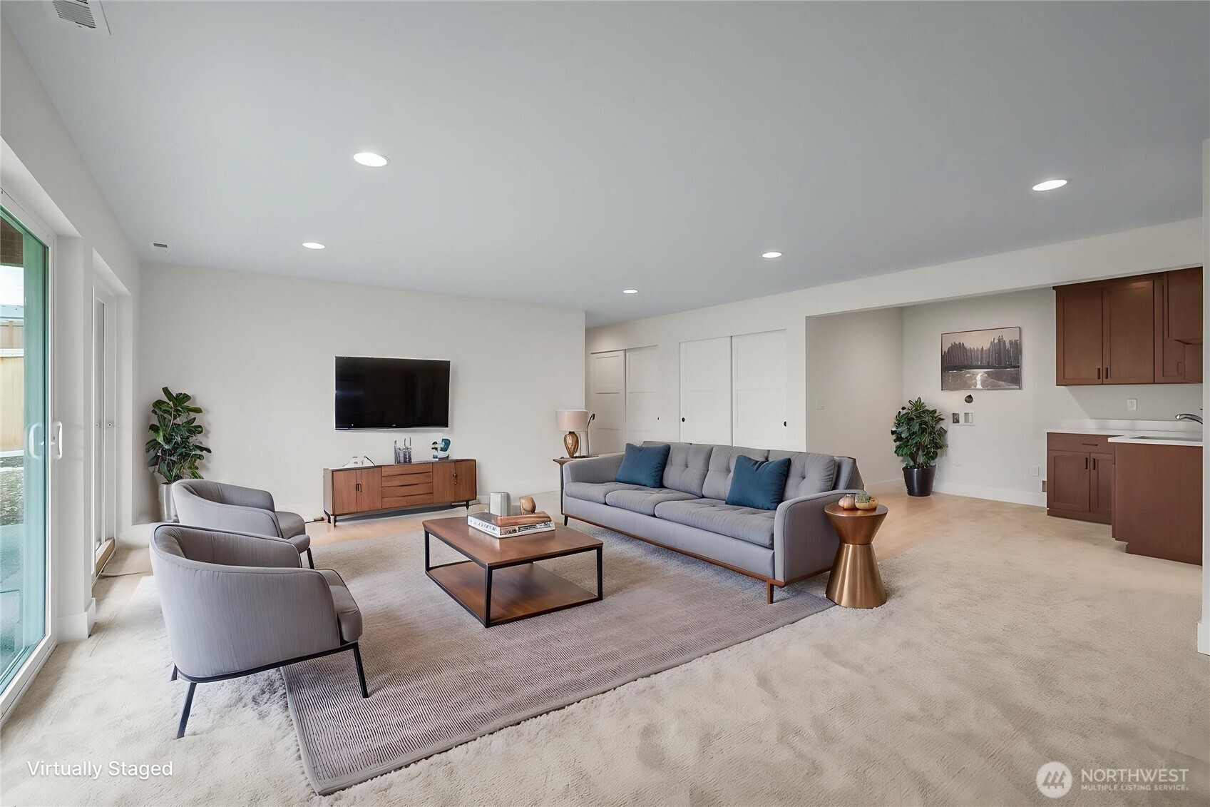 Virtually staged Rec Room/Multi-generational living with w/d hookup.