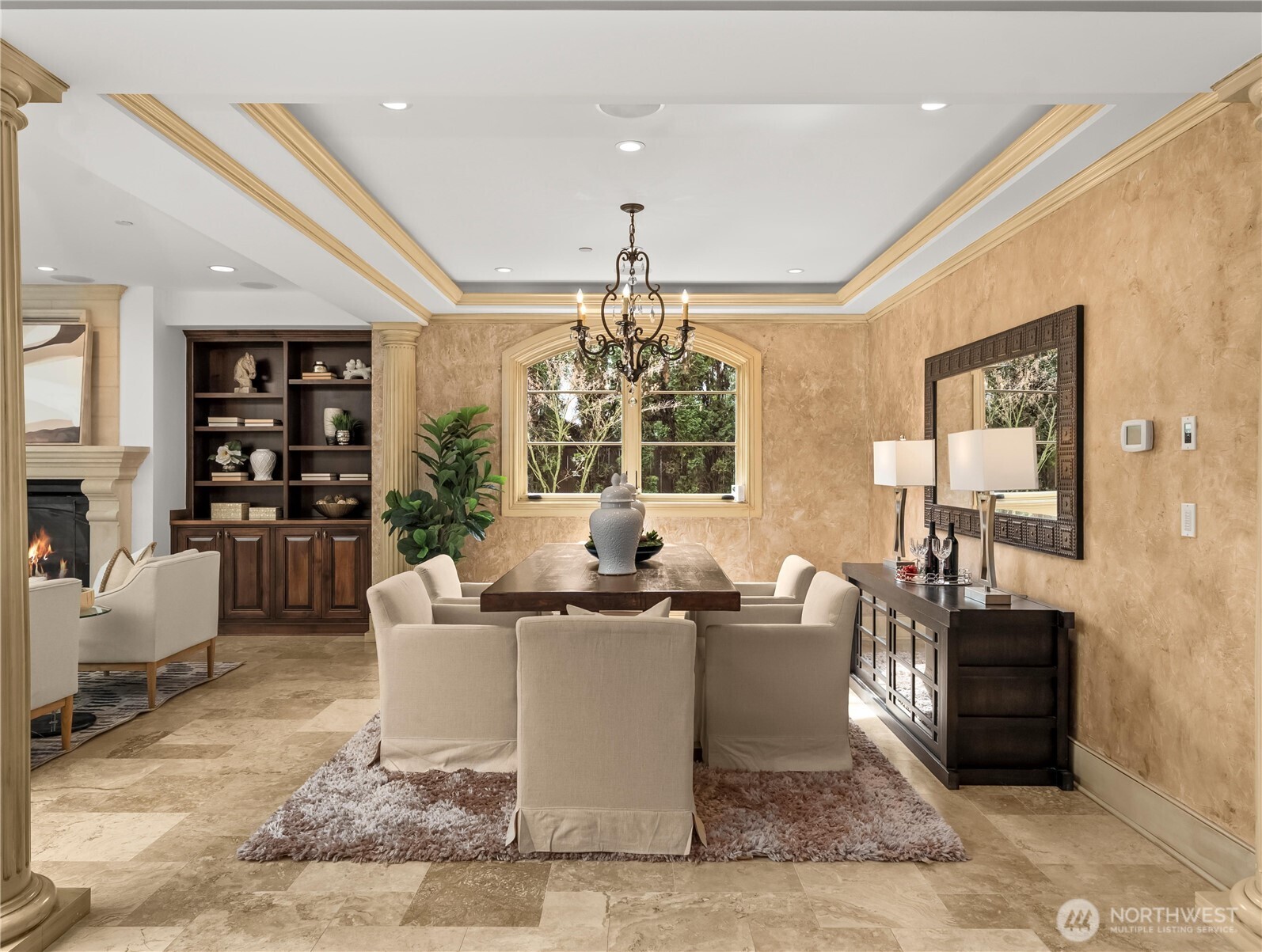 Elegant dining space connects effortlessly to indoor and outdoor living.