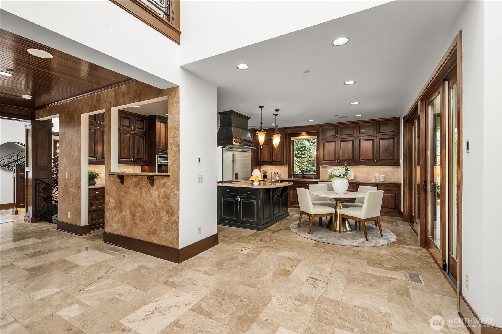 Kitchen with island and breakfast nook.