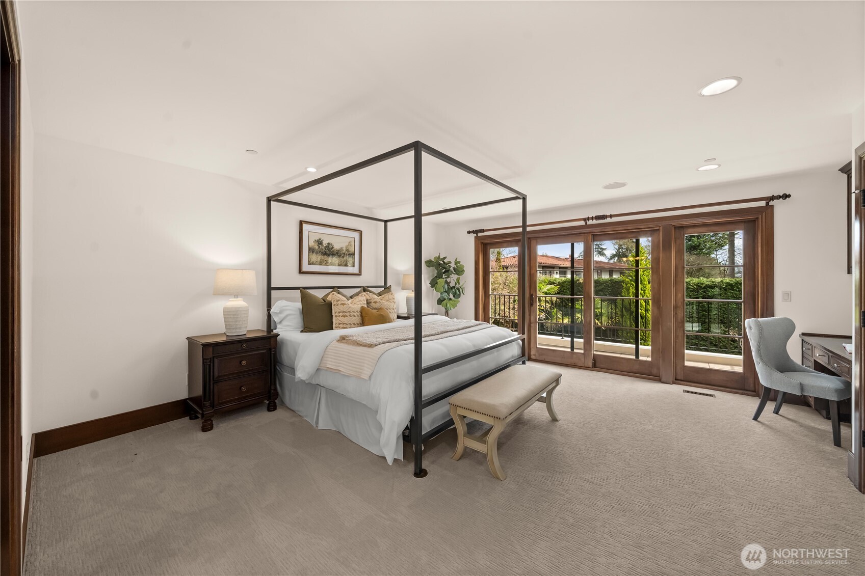 A secondary primary suite designed for comfort and privacy, complete with a refined en-suite bath