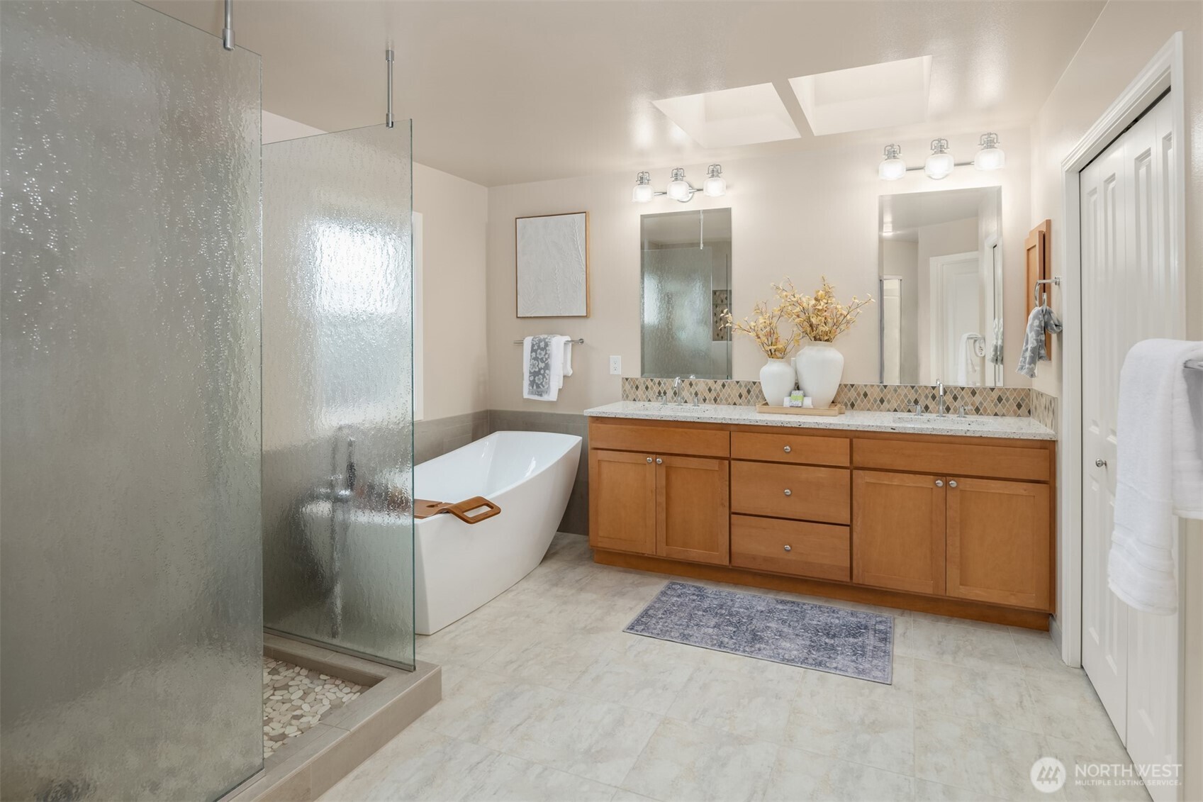 Primary, spa-like bathroom updated in 2018.