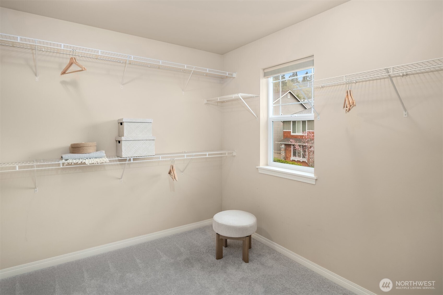 Primary walk-in closet.