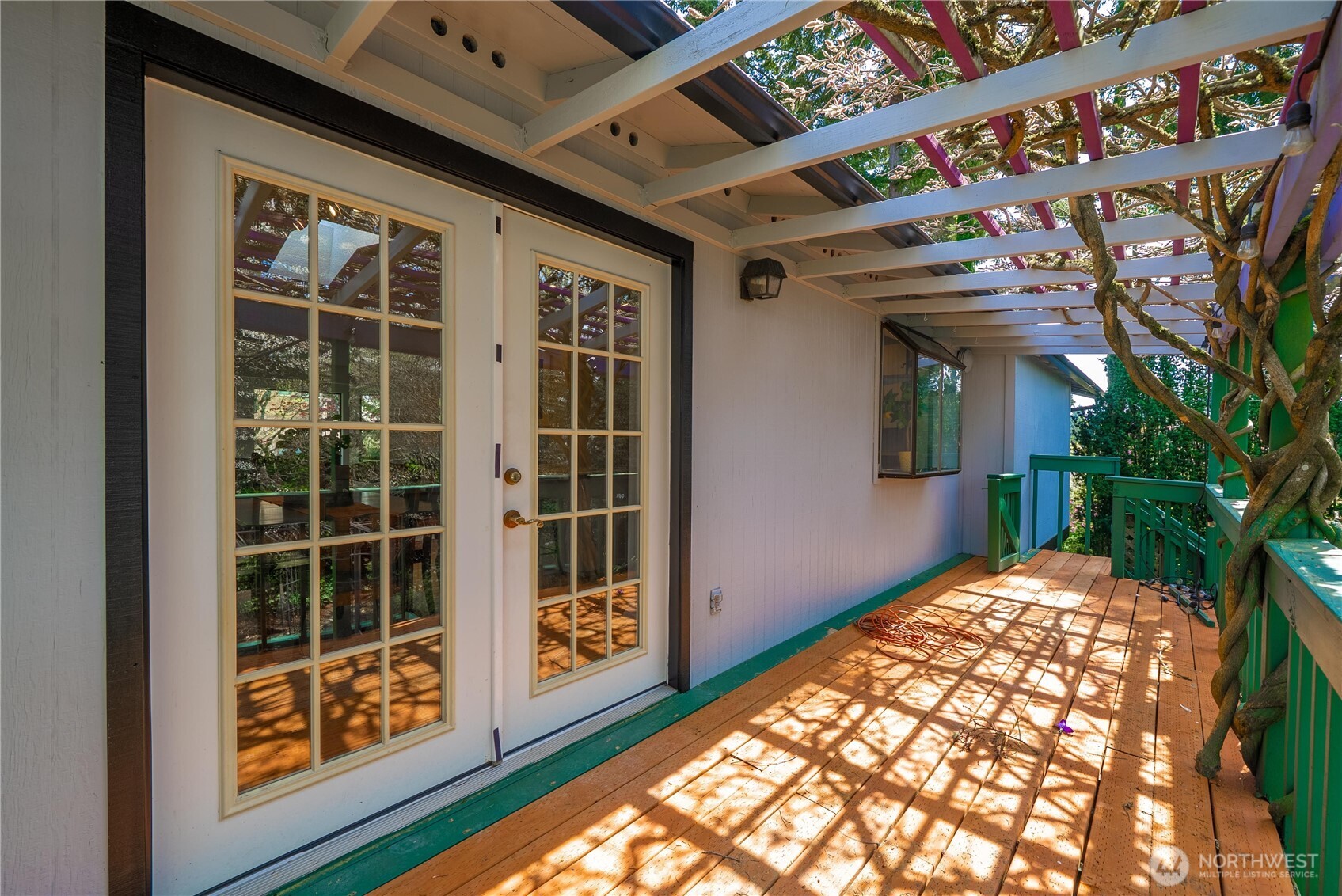 French doors out to expansive deck