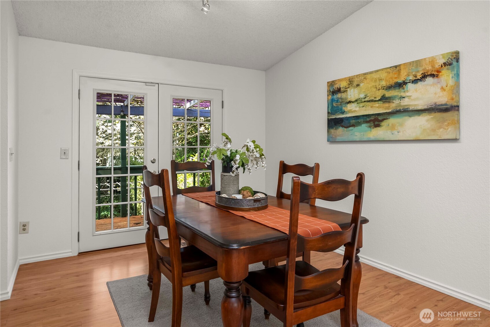 French doors out to your deck and yard