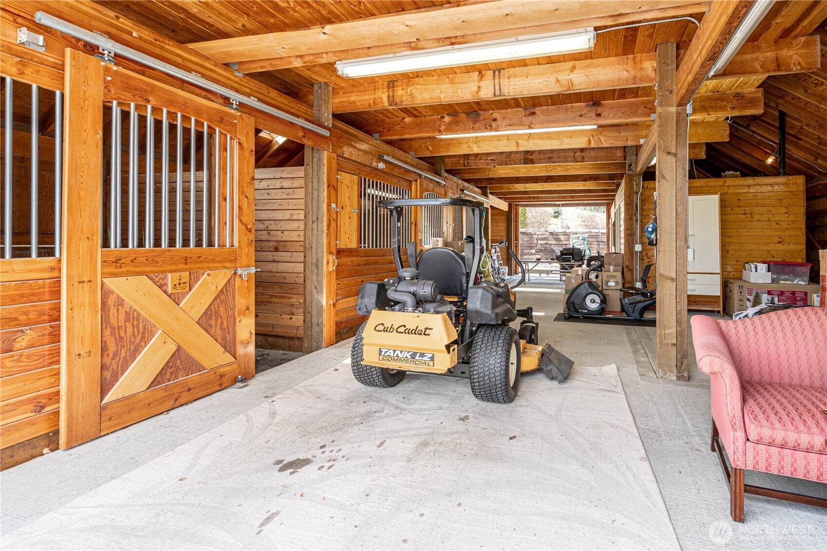 Equestrian-ready barn with horse stalls
