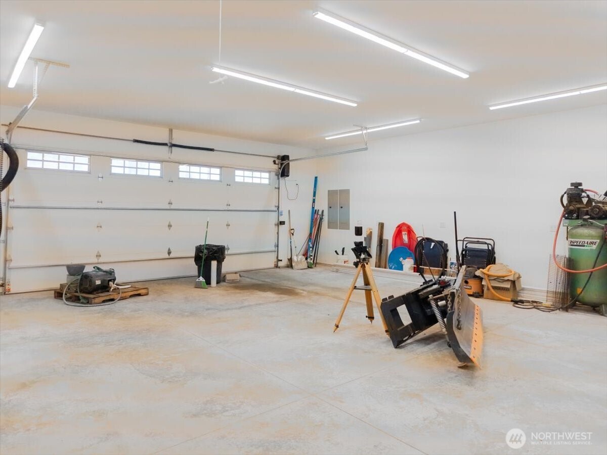 Garage next to Laundry and off of the doorway leading back into Kitchen