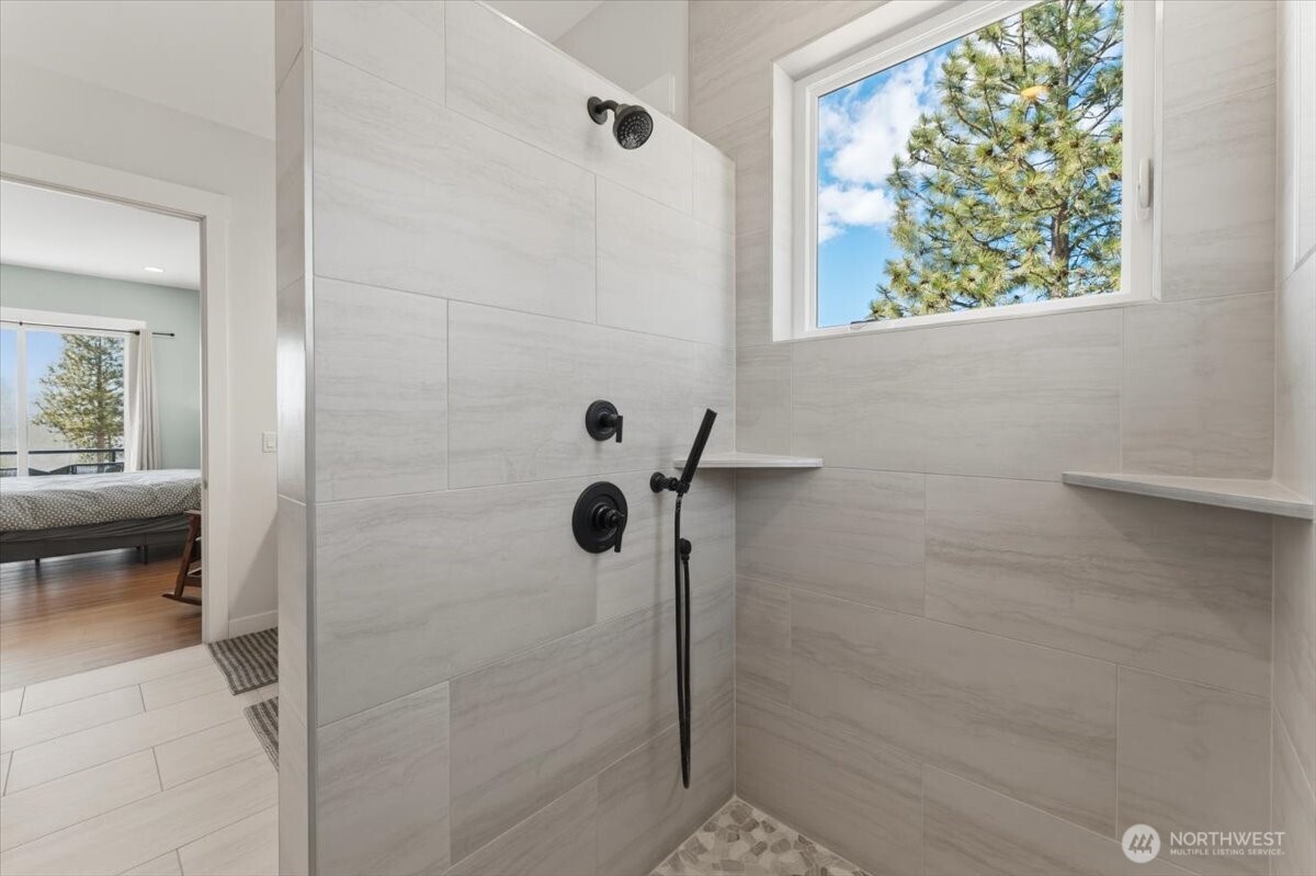 Floor to ceiling tiled shower