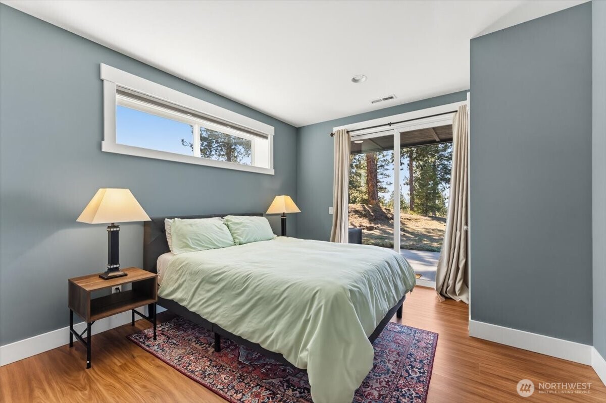 Guest Bedroom with slider to access the covered patio