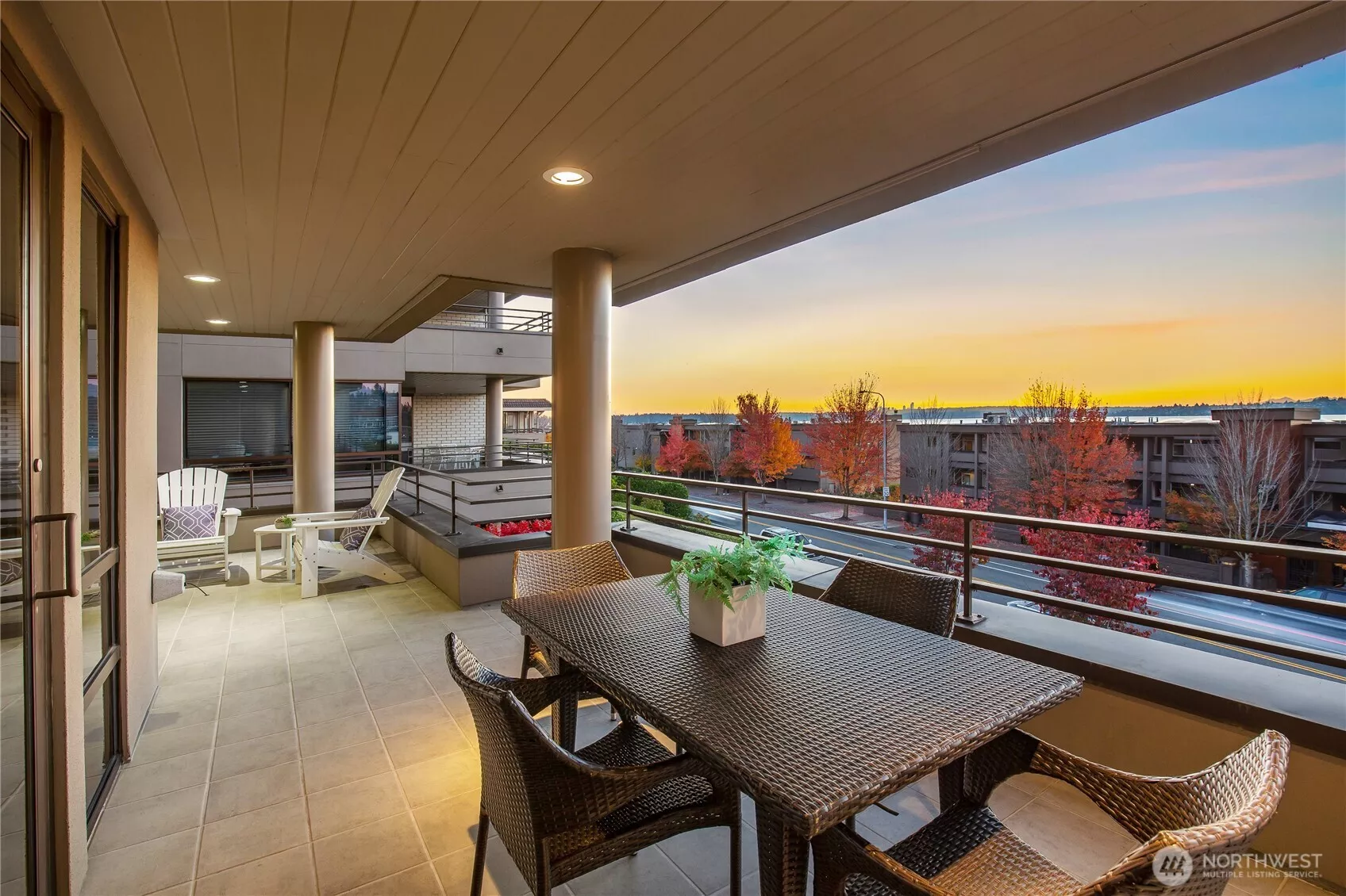 The one you have been waiting for! Unwind and take it all in with this beautifully updated, ground floor, lock-and-leave retreat showcasing stunning west-facing views of the lake, city skyline, and Olympic Mountains.