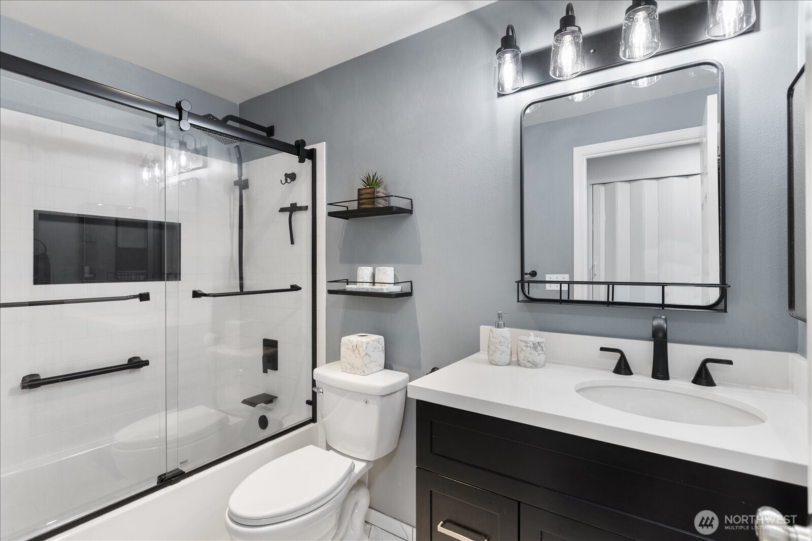 Main bath, nicely updated for all your needs.