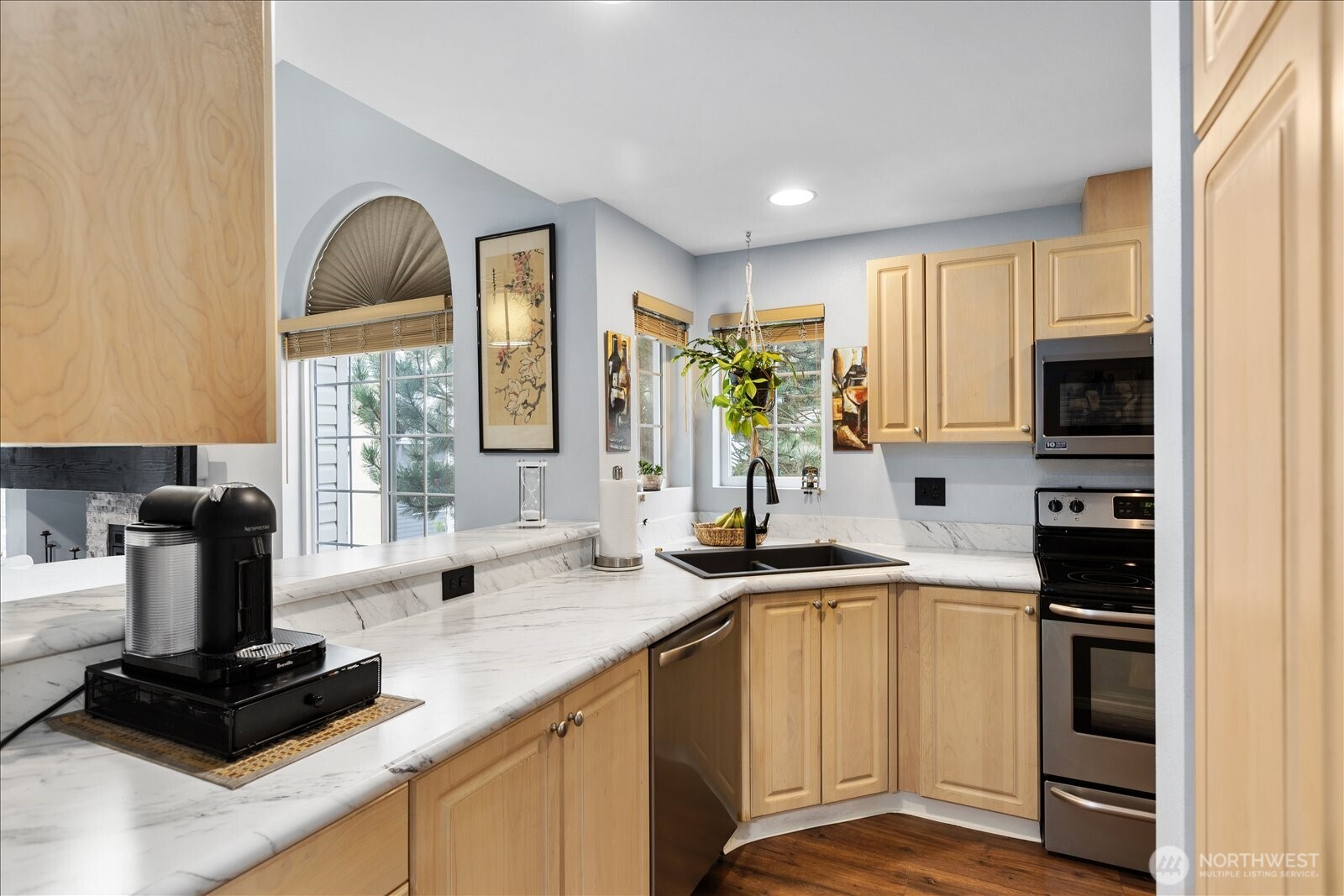 Large kitchen with Stainless steel appliance and lots of storage.