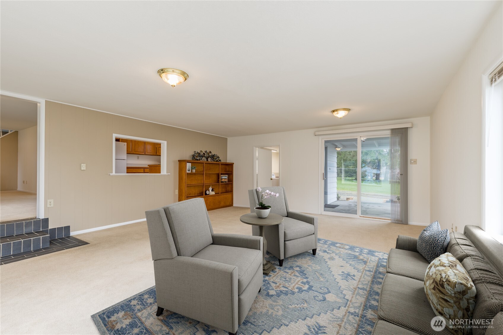 Living room includes built-in bookcase