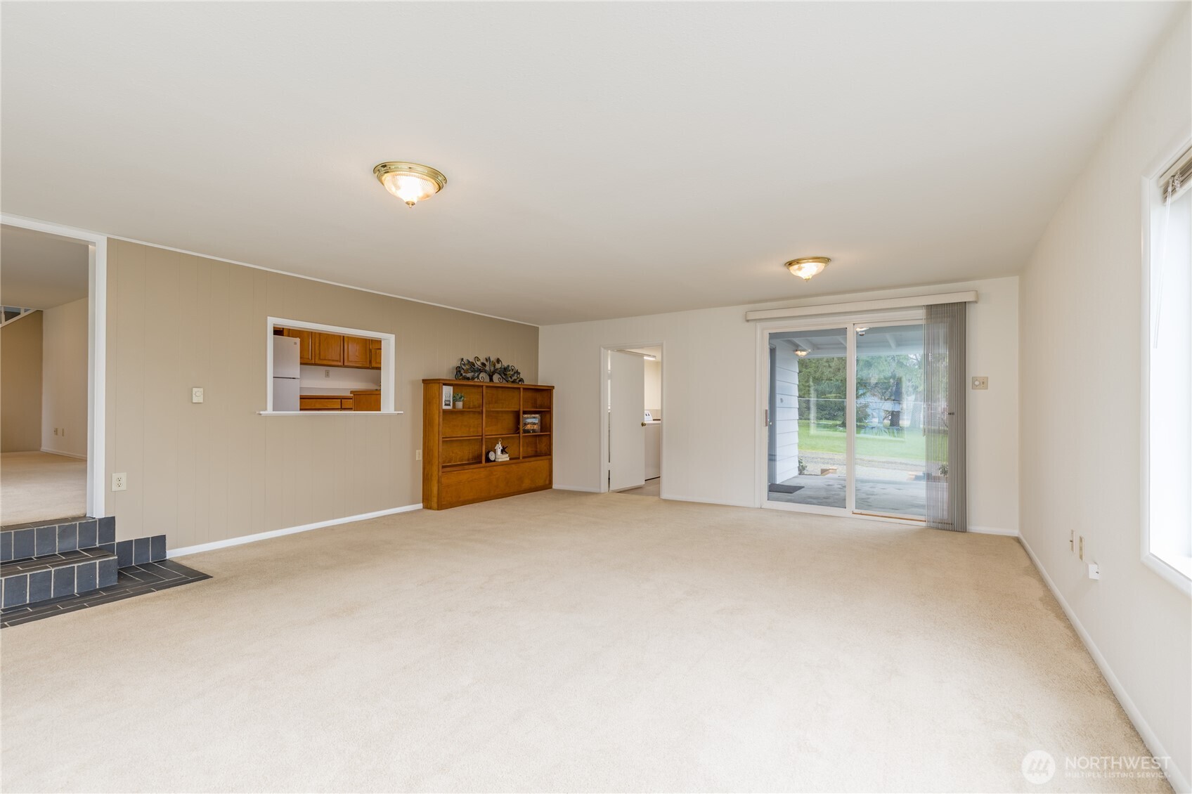 Living room includes built-in bookcase