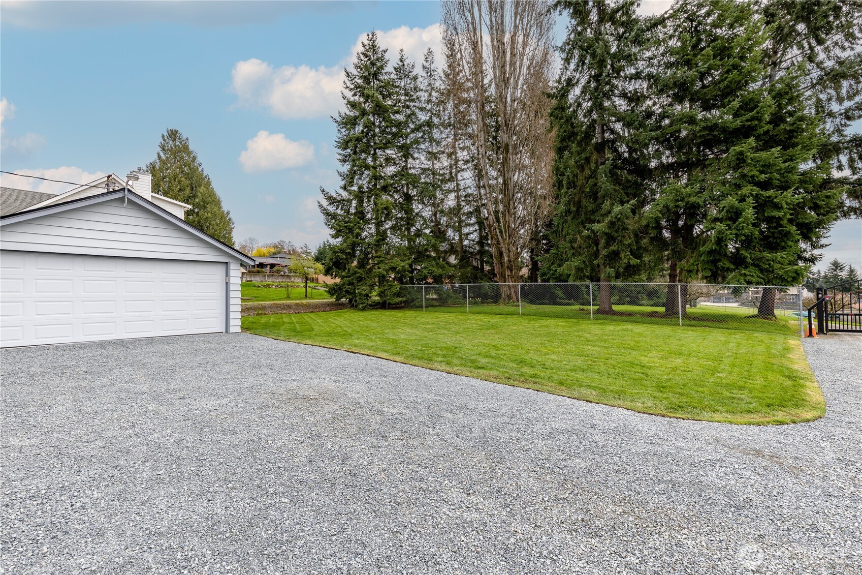 Beautifully-maintained back lawn