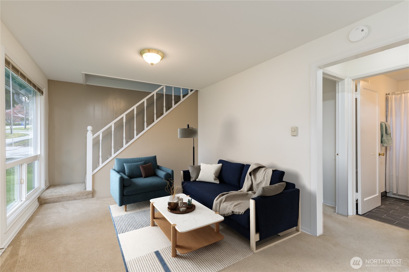 Stairs lead to loft and upper bedroom