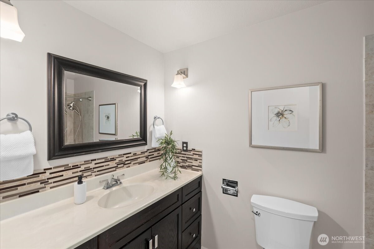 Full Bath located off hallway upstairs