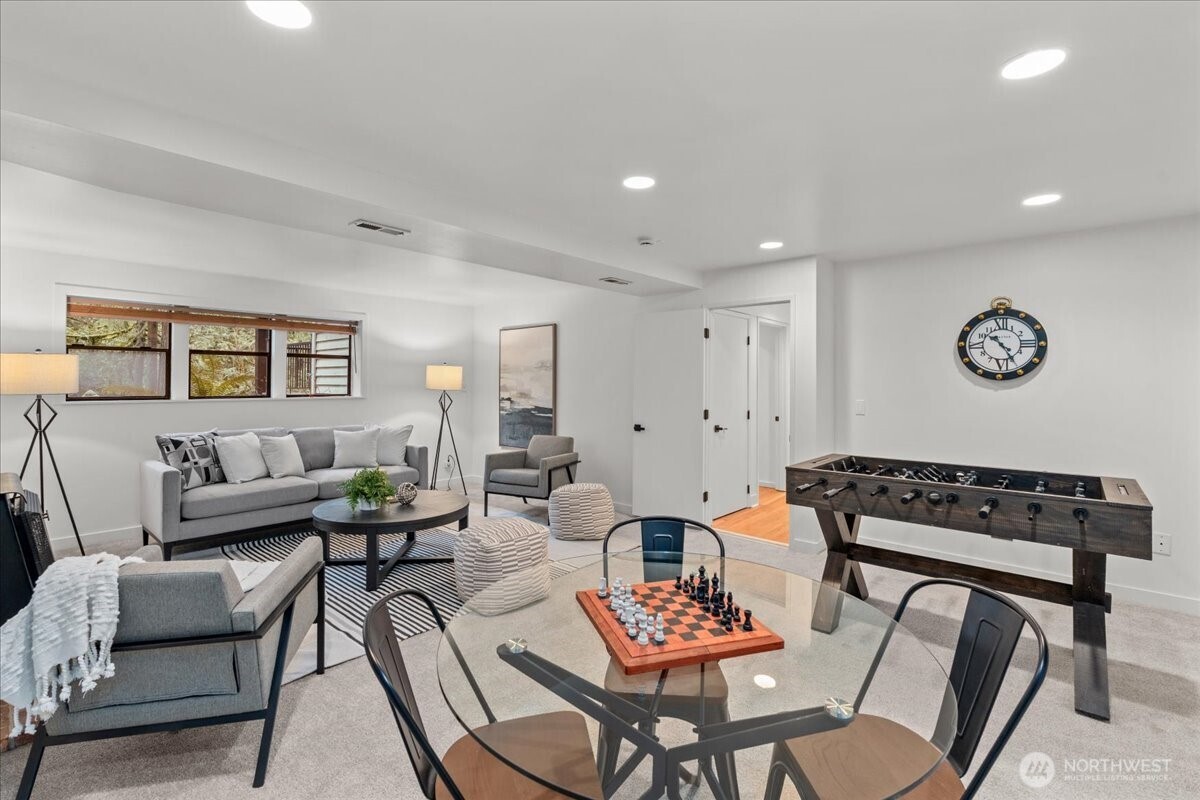 This space offers excellent potential to convert into a second kitchen and living area, ideal for future ADU use