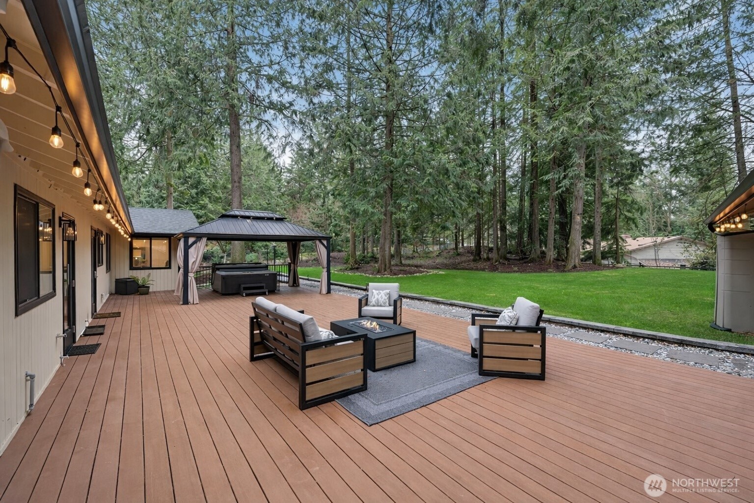 Just off the primary suite, a hot tub with a custom cabana creates the ultimate private escape.