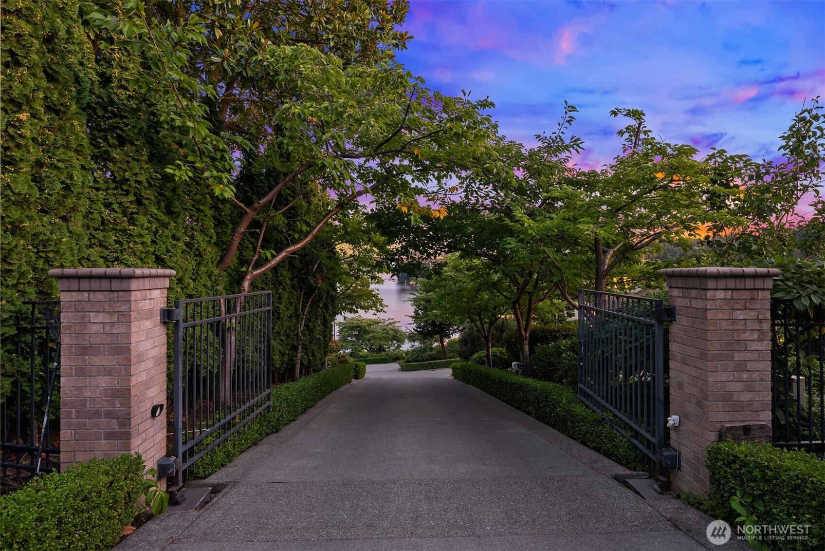 A gated drive off of Enatai Drive leads to the property.
