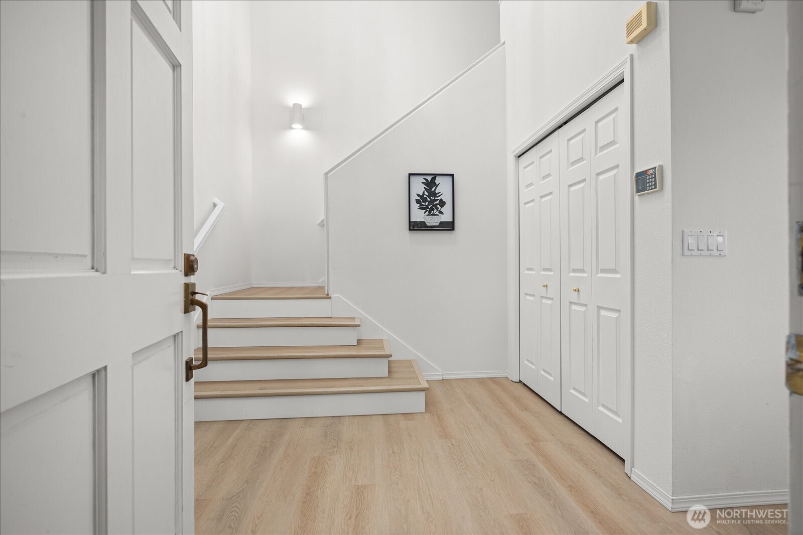 Newly Installed Luxury Vinyl Flooring Throughout