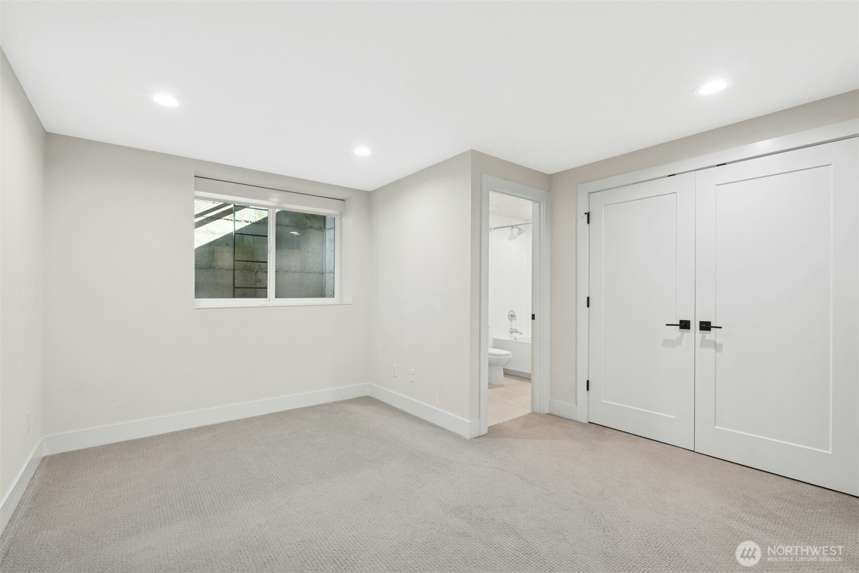 Lower-level ADU-ready suite with full bath offers flexibility for guests, multigenerational living, or rental potential