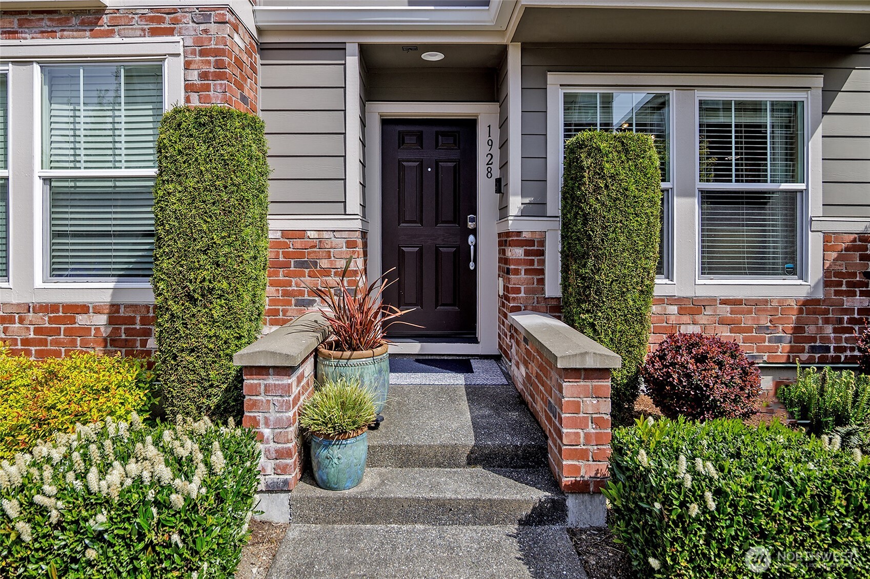 Entry with adjacent garden area