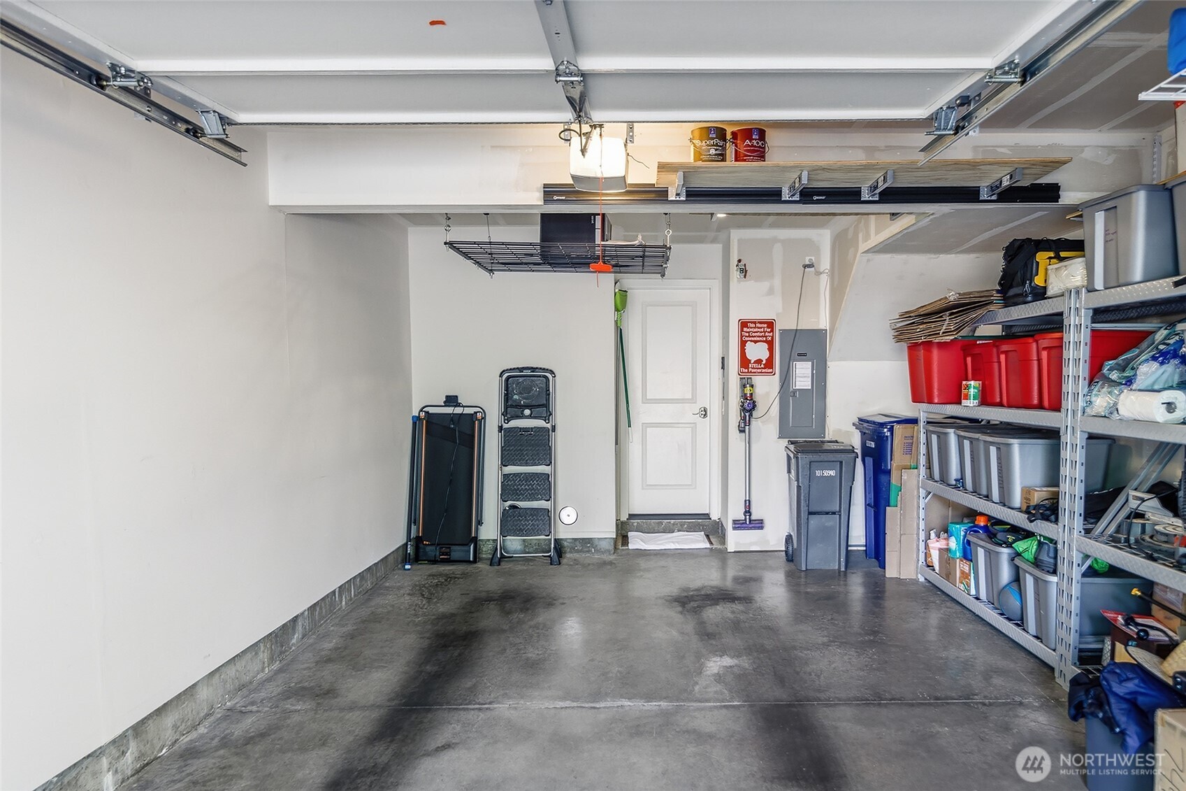 Garage with extra storage, shelving can stay