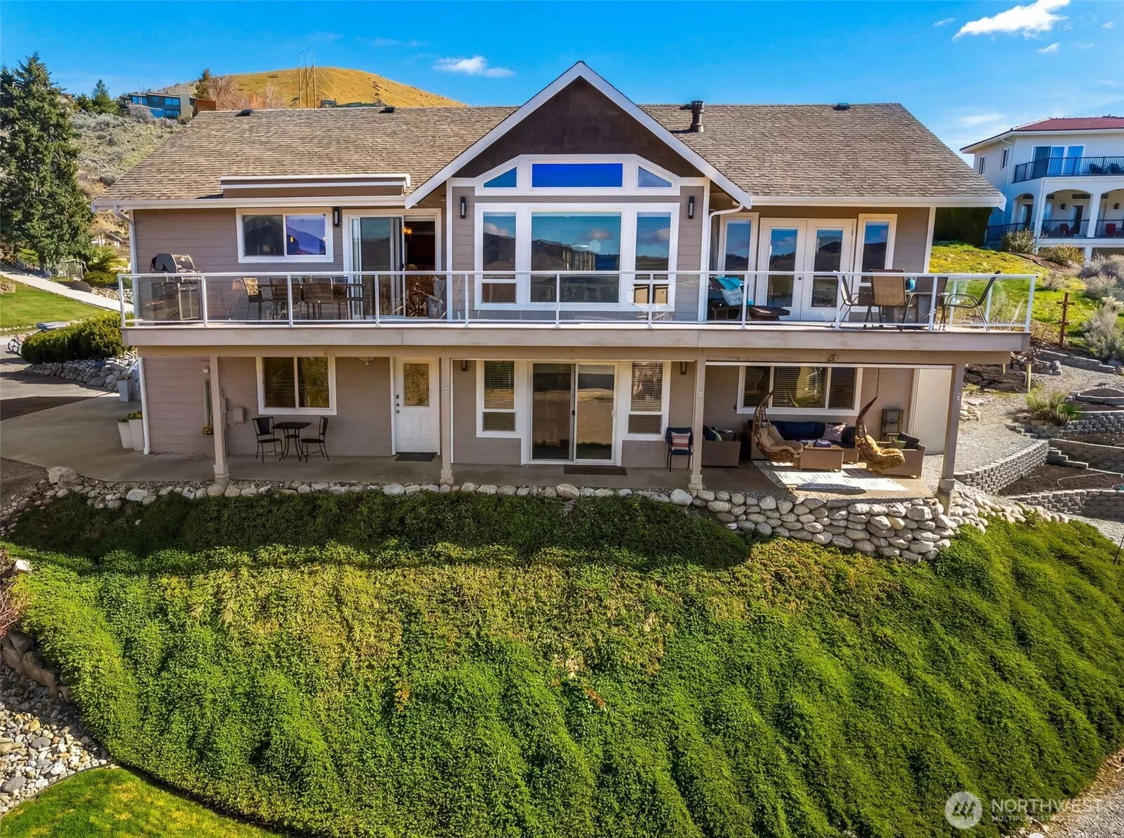 Welcome to 204 Stehekin Way! This 2,864 sq ft Lake Chelan home features generous indoor and outdoor spaces, including a view deck and covered lower patio for year-round enjoyment.